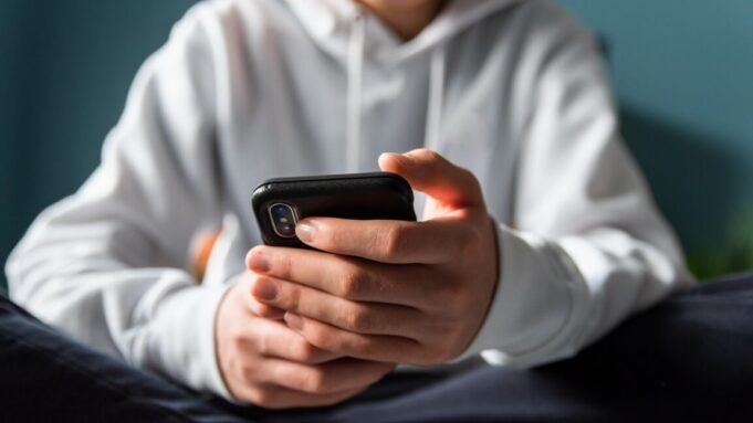 boy-with-phone-1152x648-1760722441.jpg