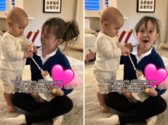 La figlia vede il fratellino in piedi per la prima volta; la madre è scioccata dalla reazione