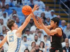 Mikel Brown Jr. in questione come numero 6 di Louisville dà consigli contro il numero 11 dell’USF