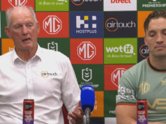 L’allenatore dei South Sydney Rabbitohs Wayne Bennett implora i fan di non prendere d’assalto il campo mentre Alex Johnston batte il record di mete